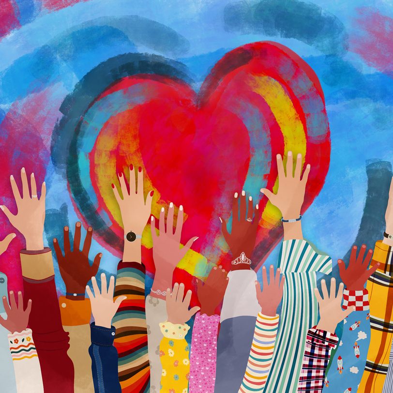 Hands raised toward multi-colored heart